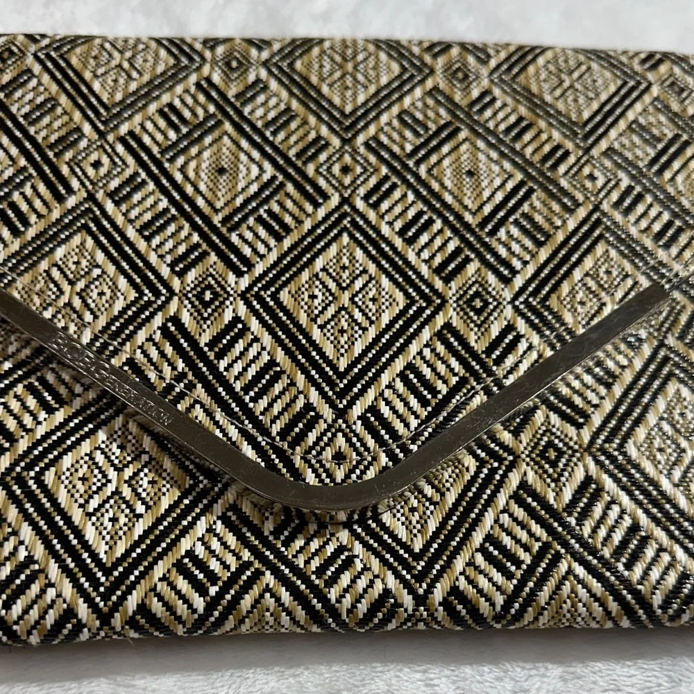 NWT BCBG cream,tan and black woven envelope clutch
